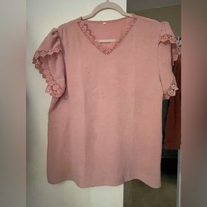 Pretty Swiss dot top with crochet lace details on the sleeve